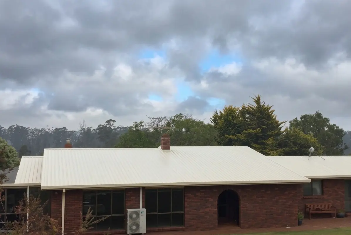Fresh cream metal roof completed on a Tasmanian brick home