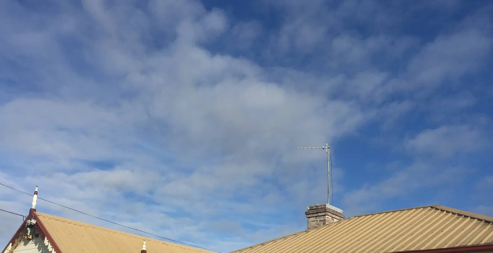Beige metal roof before preparation and repainting in Ulverstone Tasmania